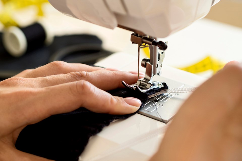 high-angle-sewing-machine-being-used (1)